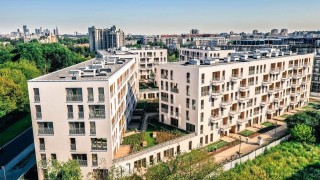 Moje Miejsce z biurowcem i budynkami mieszkalnymi