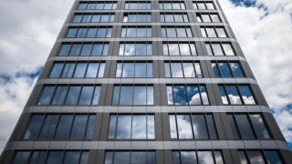 Grupa Pracuj z biurami w biurowcu Astris