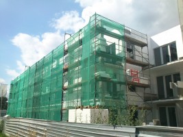 Wykonywanie elewacji zewnętrznej i tynków wewnętrznych, wykonanie prac w 60%