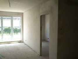 Wykonywanie elewacji zewnętrznej i tynków wewnętrznych, wykonanie prac w 60%