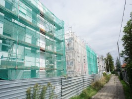 Wykonywanie elewacji zewnętrznej i tynków wewnętrznych, wykonanie prac w 80%